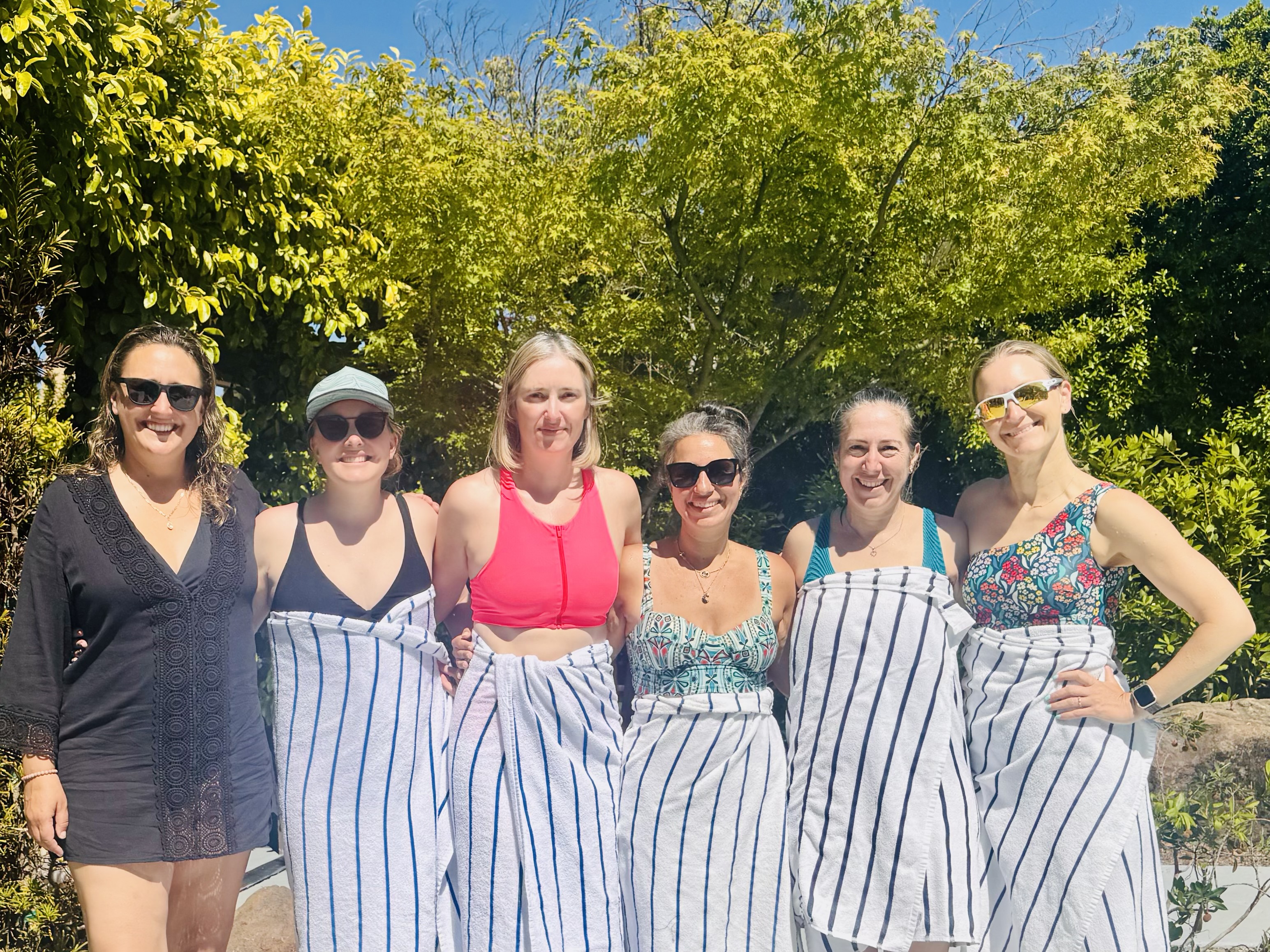 Cris with friends outdoors in the sun